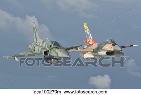 Picture - Venezuelan Air Force F-16 and Brazilian Air Force F-5 in flight over Brazil.. Fotosearch