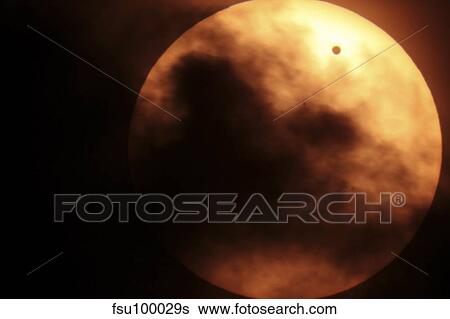 Stock Photograph - Venus transiting in front of the Sun.. Fotosearch