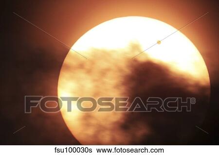 Stock Photograph - Venus transiting in front of the Sun.. Fotosearch