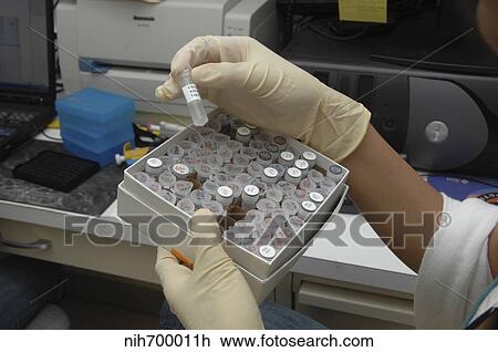 Vials containing chemicals in research lab. View Large Photo Image Stock Image - Vials containing chemicals in research lab.. Fotosearch