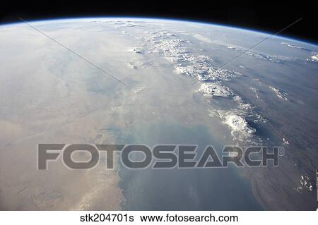 View from space showing the tropical blue waters of the Persian Gulf. View Large Photo Image Stock Photograph - View from space showing the tropical blue waters of the Persian Gulf.. Fotosearch