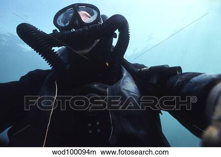 View looking up at a Navy SEAL combat swimmer. View Large Photo Image Picture - View looking up at a Navy SEAL combat swimmer.. Fotosearch