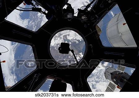 View of Earth through the Cupola on the International Space Station. View Large Photo Image Stock Photograph - View of Earth through the Cupola on the International Space Station.. Fotosearch