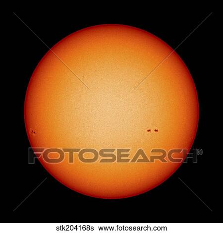 View of the Earth-facing surface of the Sun showing a few small sunspots. View Large Photo Image Stock Photograph - View of the Earth-facing surface of the Sun showing a few small sunspots.. Fotosearch