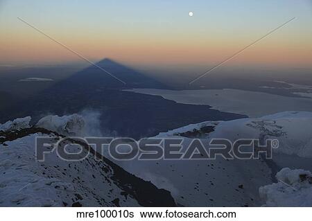 Villarrica, summit view with shadow at sunrise, Araucania region, Chile. View Large Photo Image Stock Photograph - Villarrica, summit view with shadow at sunrise, Araucania region, Chile.. Fotosearch