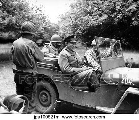 Vintage World War II photo of General Dwight D. Eisenhower sitting in a jeep. View Large Photo Image Picture - Vintage World War II photo of General Dwight D. Eisenhower sitting in a jeep.. Fotosearch