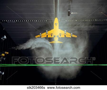 Stock Photograph - Wake Vortex flow visualization tests of a Boeing 747 model.. Fotosearch