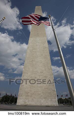Washington Monument and American Flag, Washington D. C. View Large Photo Image Picture - Washington Monument and American Flag, Washington D. C.. Fotosearch