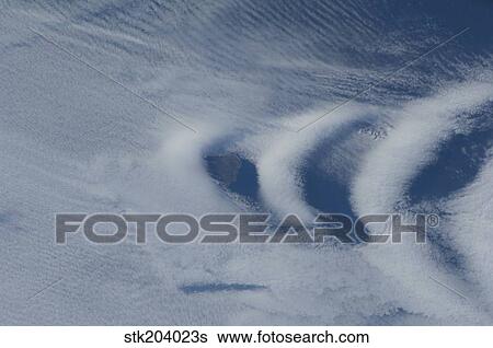 Wave clouds near Ile aux Cochons. View Large Photo Image Stock Photograph - Wave clouds near Ile aux Cochons.. Fotosearch