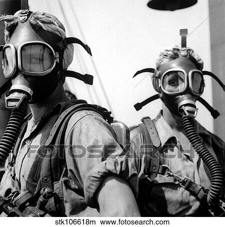 Picture - Women wearing oxygen masks.. Fotosearch
