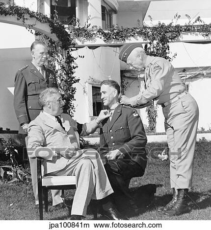 World War II photo of President Franklin Roosevelt presenting the Medal of Honor. View Large Photo Image Picture - World War II photo of President Franklin Roosevelt presenting the Medal of Honor.. Fotosearch
