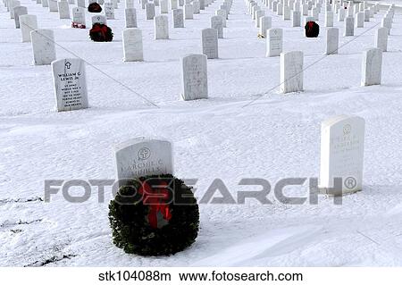 Picture - Wreaths adorn the graves of veterans at the Black Hills National Cemetery.. Fotosearch