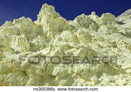 Yellow sulphur deposits inside crater, Kawah Ijen volcano, Java, Indonesia. View Large Photo Image Stock Photograph - Yellow sulphur deposits inside crater, Kawah Ijen volcano, Java, Indonesia.. Fotosearch