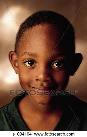 Happy African American Boy With Big Brown Eyes And Very Short