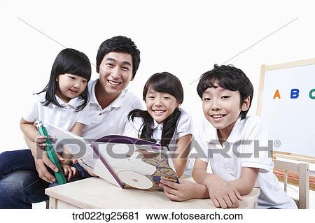 Clip Art - childen are reading . Fotosearch