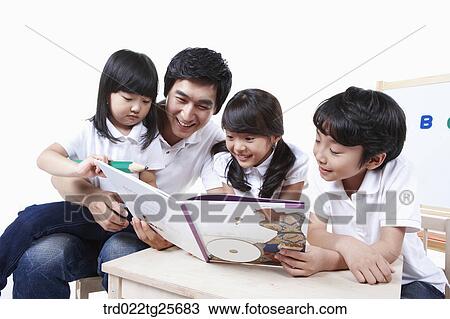 childen are reading View Large Illustration Drawing - childen are reading . Fotosearch
