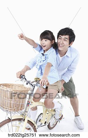 Clip Art - riding bicycle pleasantly. Fotosearch