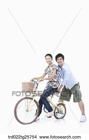 Stock Illustration - riding bicycle pleasantly. Fotosearch