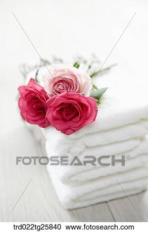 Clipart - towels and roses. Fotosearch