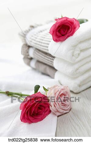 Stock Illustration - towels and roses. Fotosearch