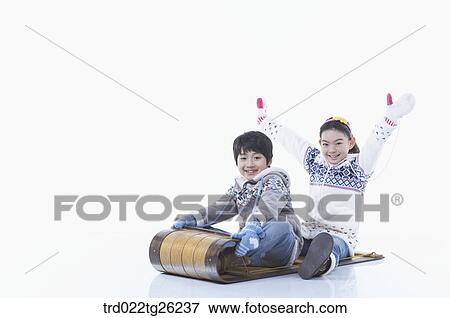 boy and girl go sleding View Large Illustration Stock Illustration - boy and girl go sleding. Fotosearch