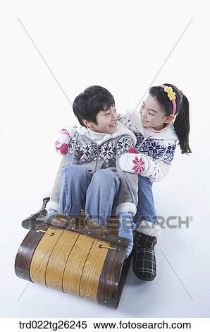 boy and girl go sleding View Large Illustration Stock Illustration - boy and girl go sleding. Fotosearch