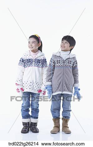 boy and girl wearing winter outer View Large Illustration Stock Illustration - boy and girl wearing winter outer . Fotosearch