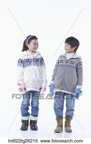 boy and girl wearing winter outer View Large Illustration Stock Illustration - boy and girl wearing winter outer . Fotosearch