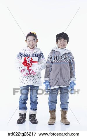 boy and girl wearing winter outer View Large Illustration Stock Illustration - boy and girl wearing winter outer . Fotosearch