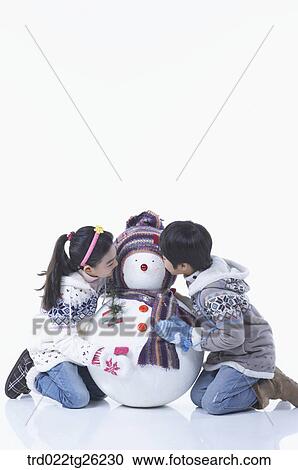 boy and girl with a snowman View Large Illustration Clipart - boy and girl with a snowman. Fotosearch