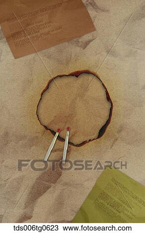 Drawing - burned paper background. Fotosearch