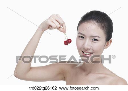 Drawing - cherry and spotless skin woman. Fotosearch