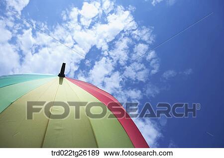 colorful umbrella in the blue sky View Large Illustration Stock Illustration - colorful umbrella in the blue sky. Fotosearch