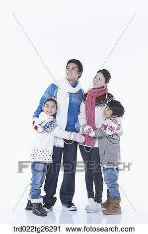family is hugging each other in winter goods View Large Illustration Clip Art - family is hugging each other in winter goods. Fotosearch
