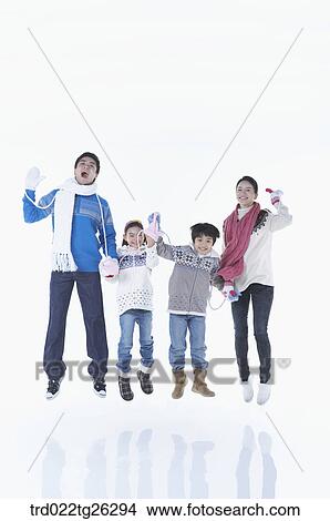 Stock Illustration - family is jumping up in winter goods. Fotosearch