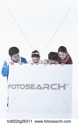 Clip Art - family members holding a board. Fotosearch