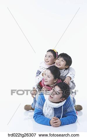 family members sitting in a row with smile View Large Illustration Stock Illustration - family members sitting in a row with smile. Fotosearch