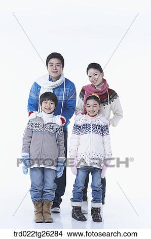 Stock Illustration - famliy is wearing winter goods with happy smile. Fotosearch