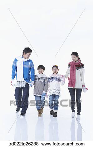 Stock Illustration - famliy is wearing winter goods with happy smile. Fotosearch