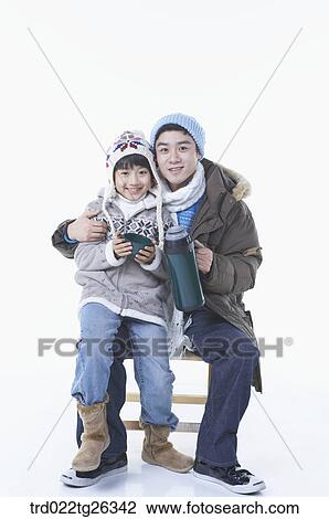 father and son holding the tumbler View Large Illustration Drawing - father and son holding the tumbler. Fotosearch
