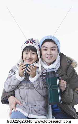 Stock Illustration - father and son holding the tumbler. Fotosearch
