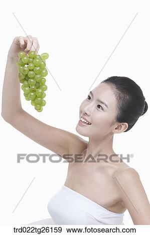 Stock Illustration - fruit and skincare of woman. Fotosearch
