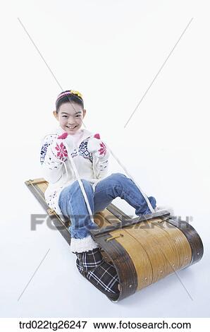Stock Illustration - girl go sleding. Fotosearch