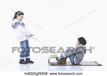 Stock Illustration - girl pulling the sled and boy sitting on . Fotosearch