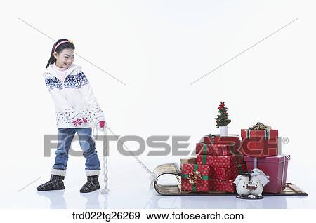 girl pulling the sled that christmas presents were on it View Large Illustration Stock Illustration - girl pulling the sled that christmas presents were on it. Fotosearch