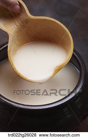 Stock Illustration - gourd cup and Korean traditional alcohol made from grain. Fotosearch