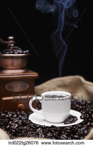 Stock Illustration - grinder and coffee and roasted coffee beans in the sack. Fotosearch