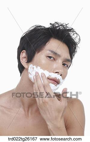 Stock Illustration - guy is shaving his face . Fotosearch