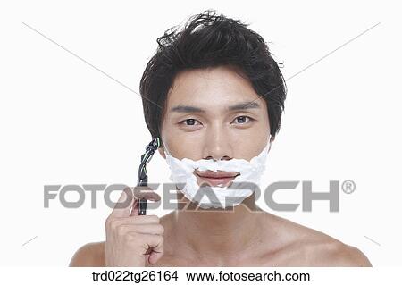 guy is shaving his face with razor View Large Illustration Stock Illustration - guy is shaving his face with razor. Fotosearch