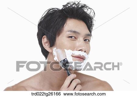 Stock Illustration - guy is shaving his face with razor. Fotosearch